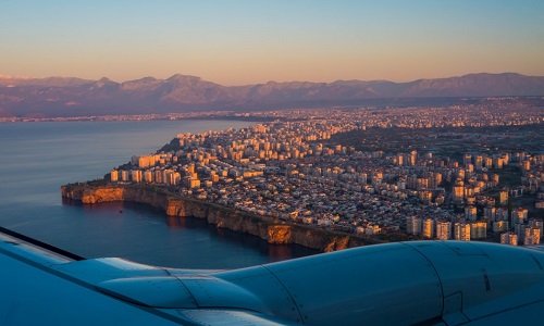 antalya city view under a wing of airplane, a fun filled tour package for you by bestservice